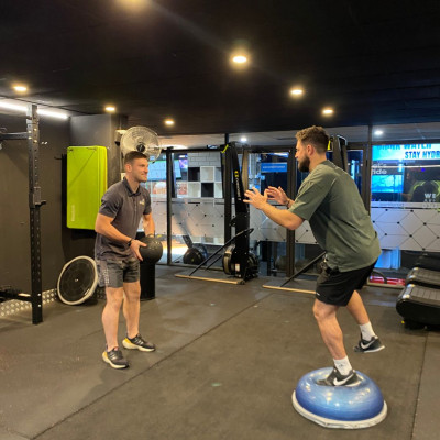 My Local Physio Plus Physiotherapist Ben Toffoli exercising with patient at Benefitness gym